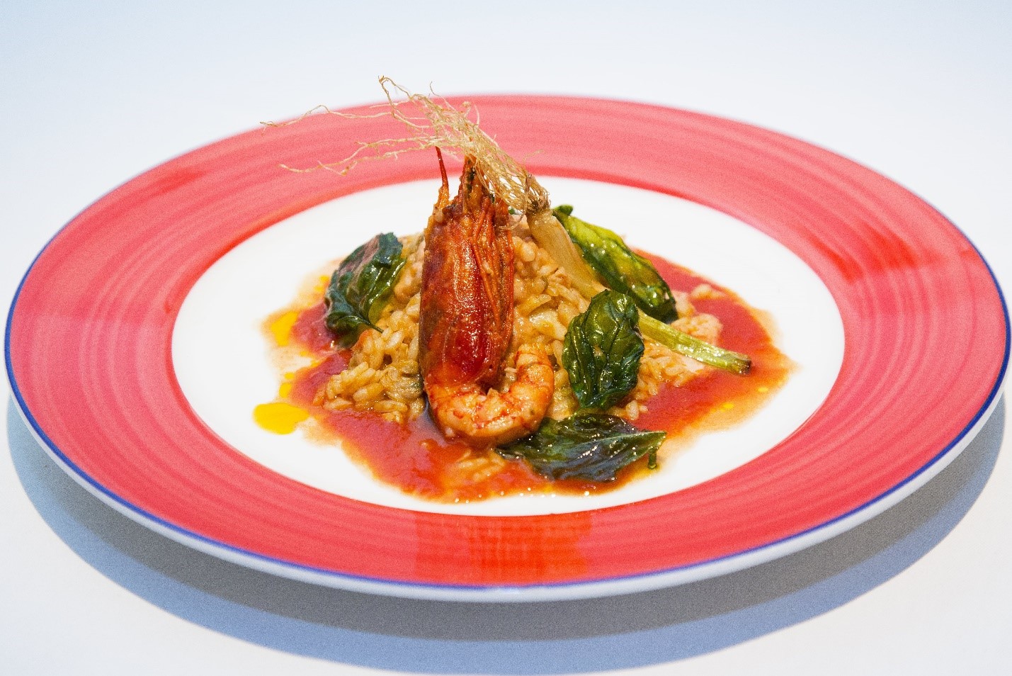 Tomato-red seafood risotto