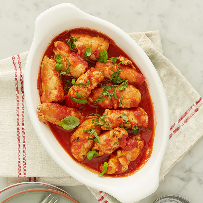 Spicy chicken roulades in tomato sauce