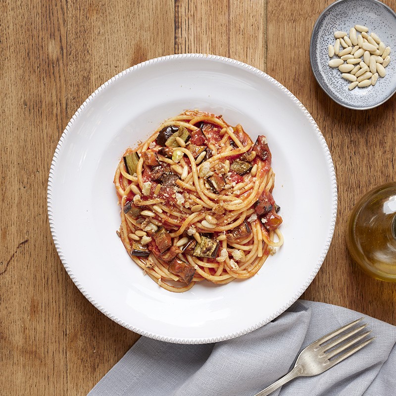 Spaghetti with aubergine, pine nuts and crispy breadcrumbs